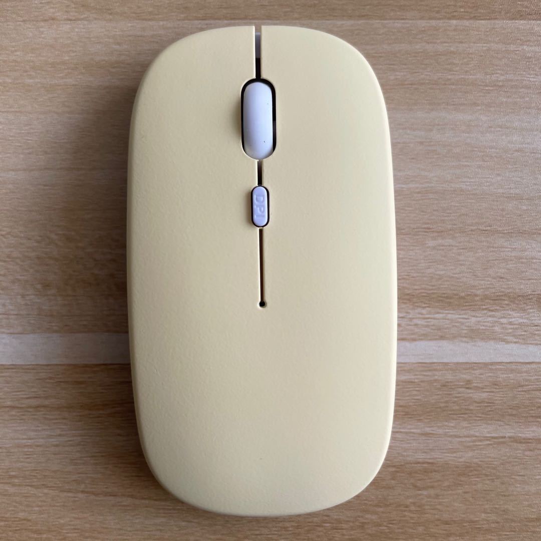 Mouse Dual-mode Charging Wireless Mouse in soft yellow color design.